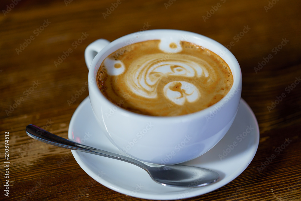 Latte art coffee. Coffee cup in coffee shop