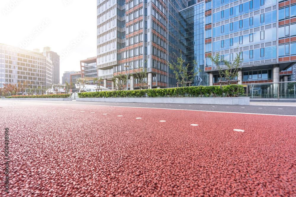 empty asphalt road with modern office building