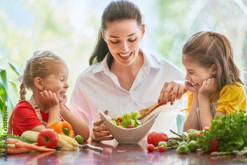 Happy family in the kitchen.