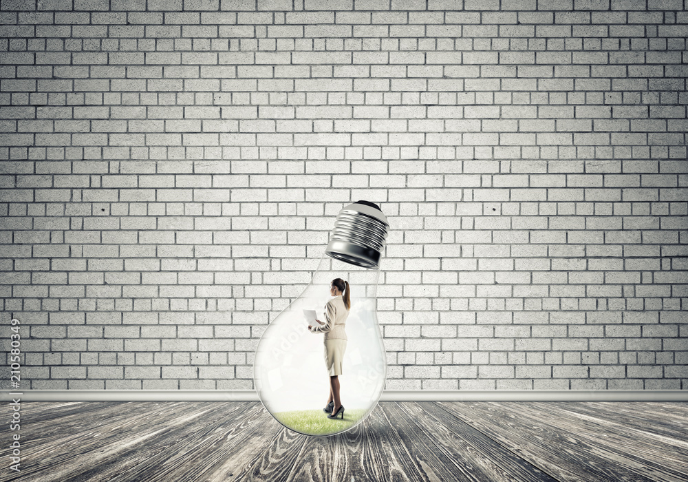 Businesswoman trapped in bulb