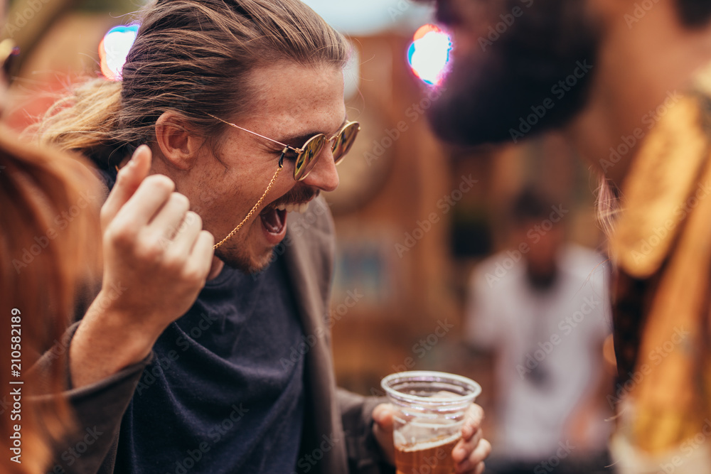 Hipster having a great time at music festival