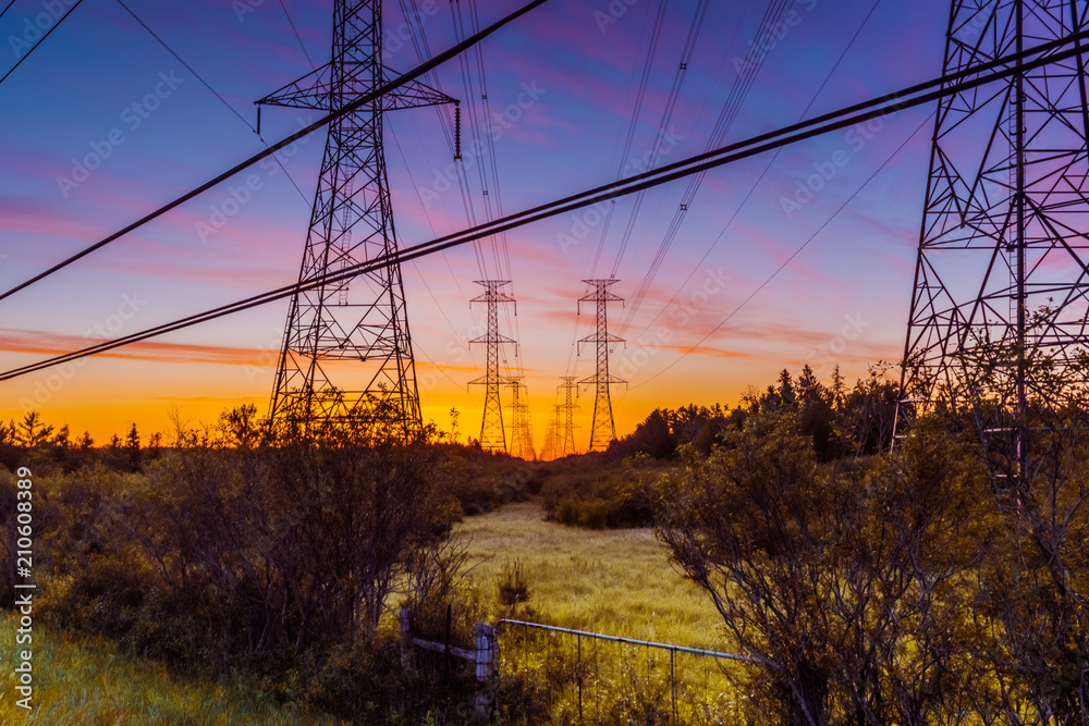 OTTAWA, ONTARIO / CANADA - JUNE 10 2018: ELECTRICAL POWER LINE AT SUNRISE