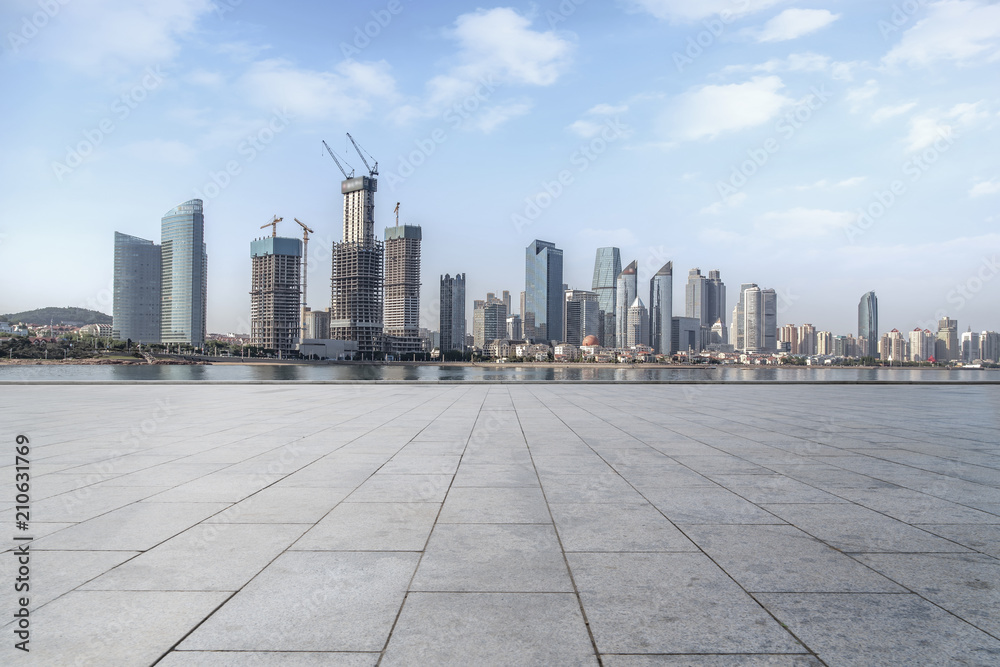 Urban skyscrapers with empty square floor tiles