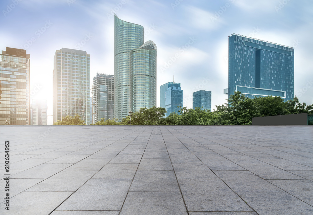 Urban skyscrapers with empty square floor tiles