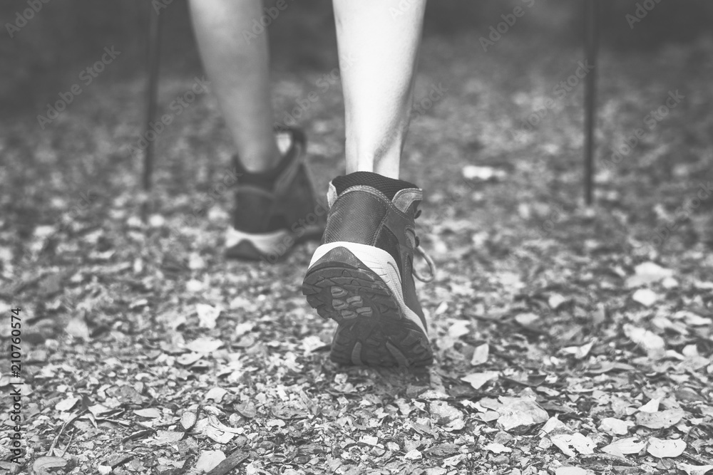 Close-up image of woman wearing trekking shoes