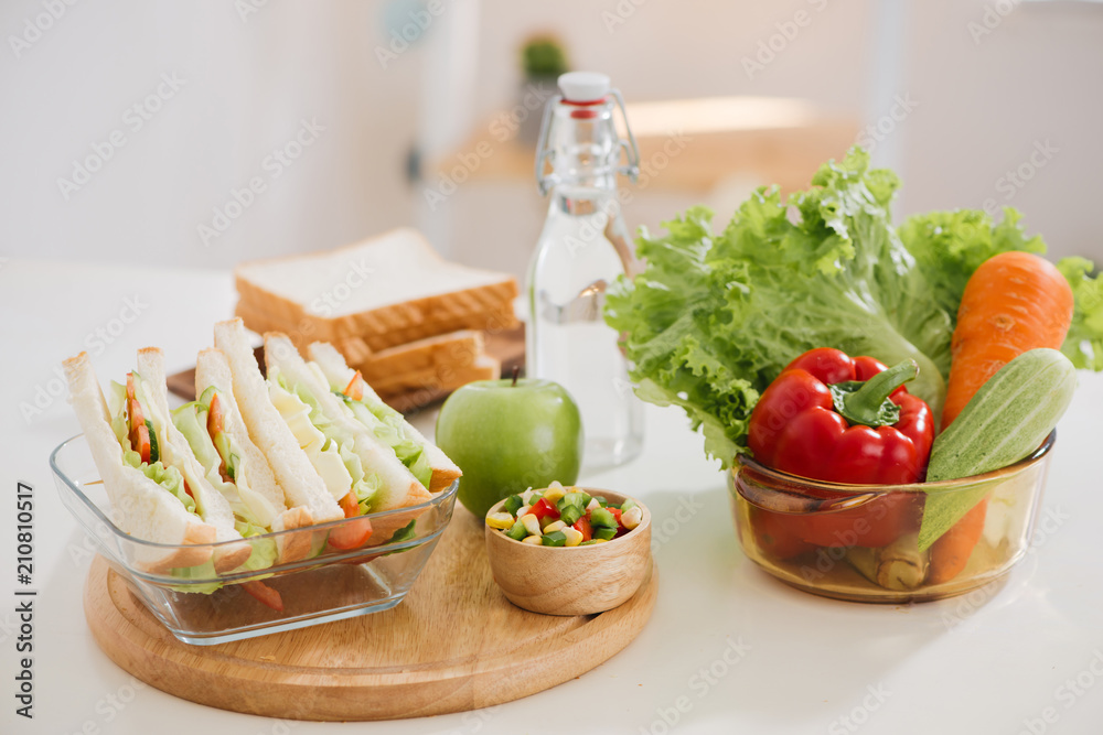 Lunch box and healthy food on isolated background