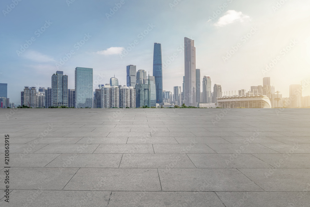 Urban skyscrapers with empty square floor tiles