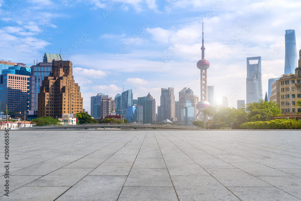 Urban skyscrapers with empty square floor tiles