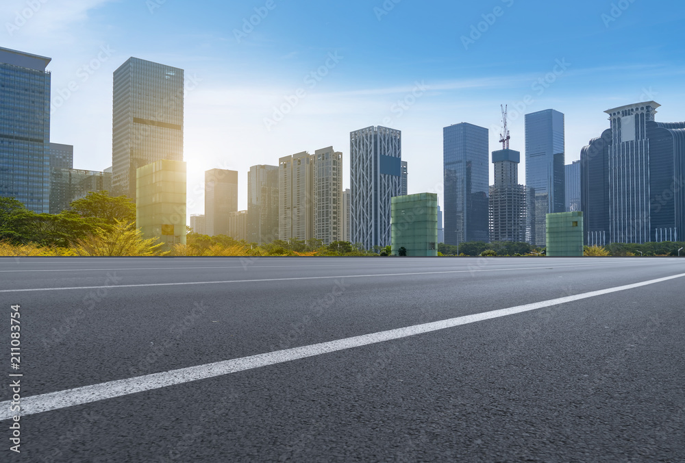 empty road with panoramic cityscape