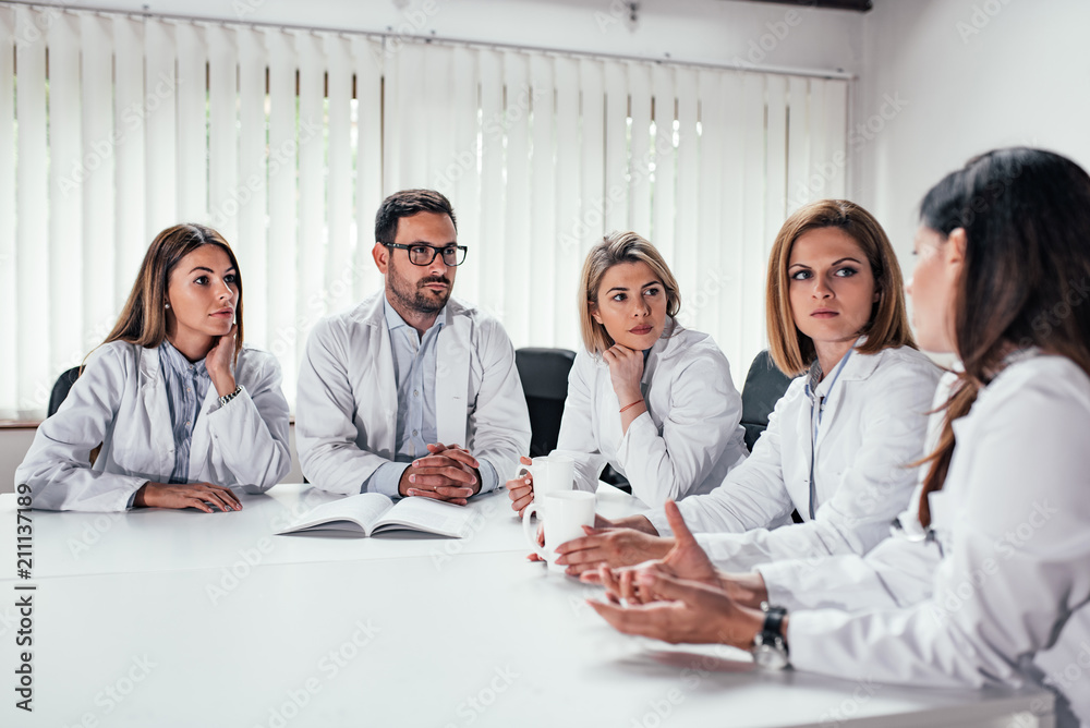 Medical professional during the meeting in the conference room.