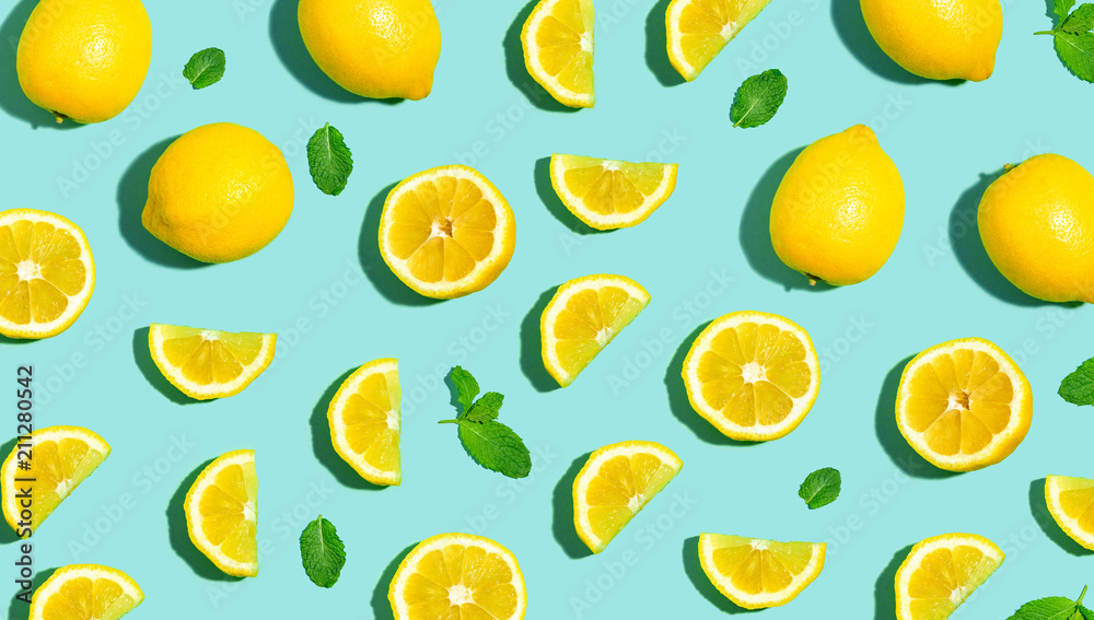 Fresh lemon pattern on a bright color background flat lay