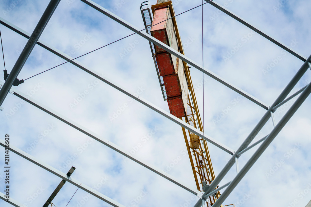 crane tower at site construction with background of clear blue sky