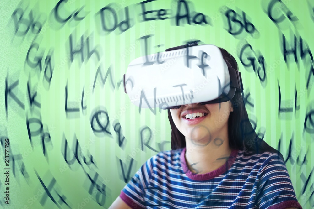 Composite image of happy woman looking through virtual reality