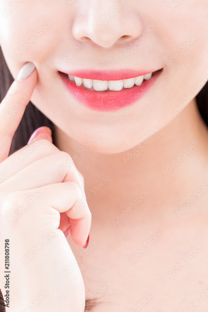 close up woman tooth