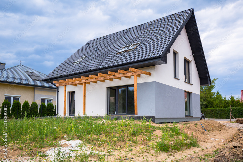 Newly built house with a finished plaster and paint