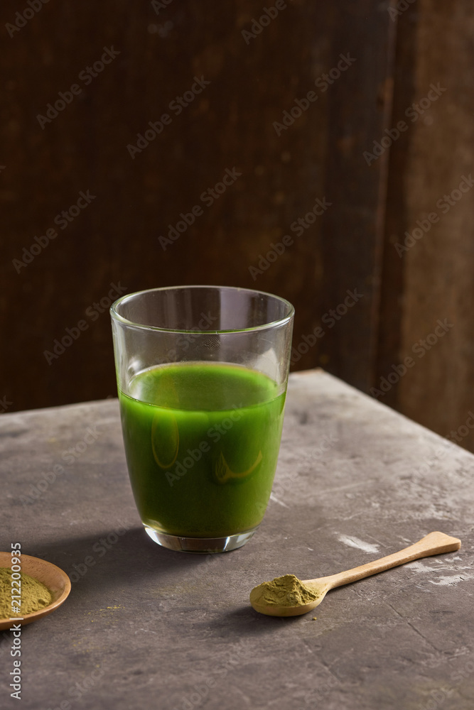 Matcha green tea latte in glass cup