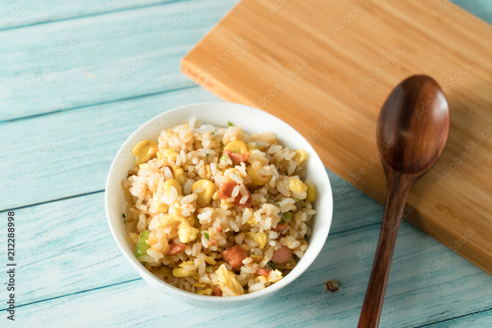 Egg Fried rice with a blue wood grain background