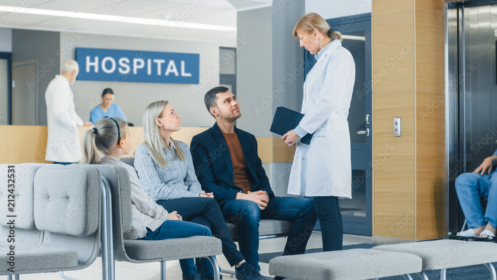 In the Hospital, Young Family of Father, Mother and Little Daughter Waiting for Test Results in the 