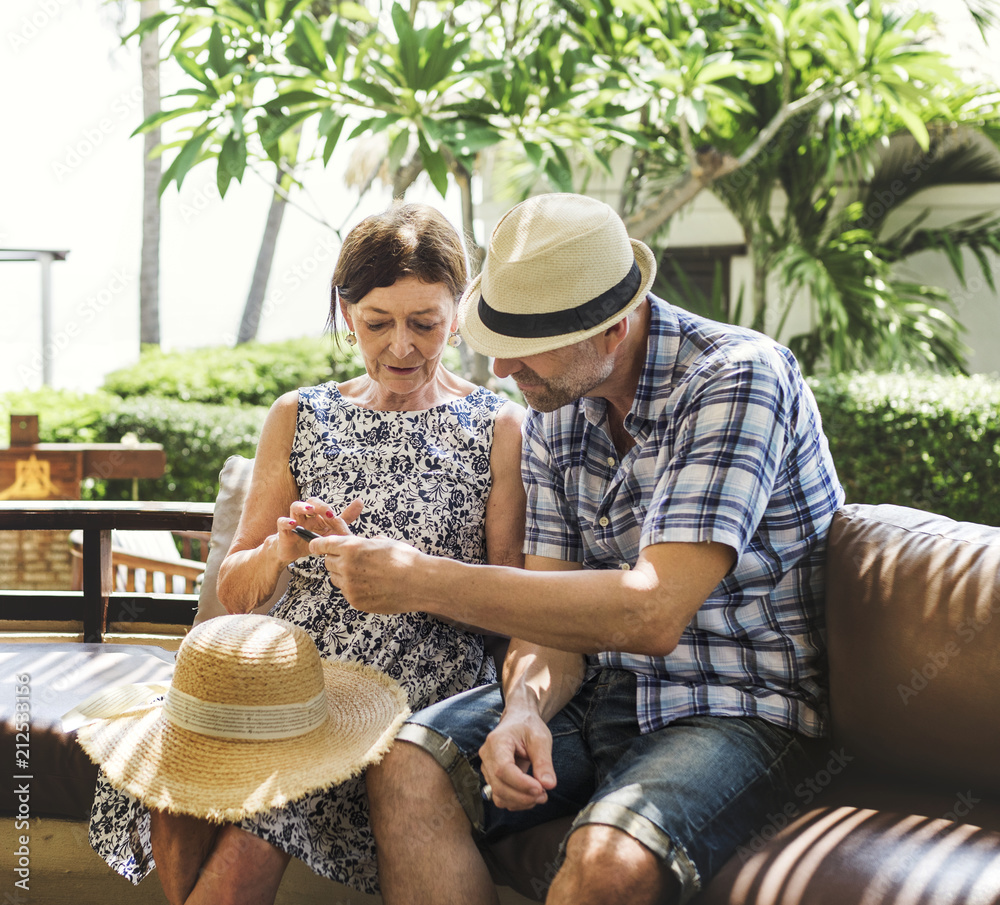 Couple waiting in a hotel lobby