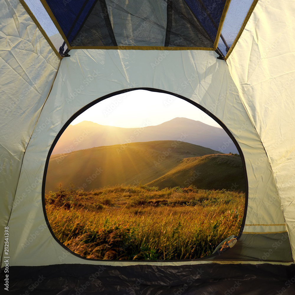 View from inside a tent on mountains landscape