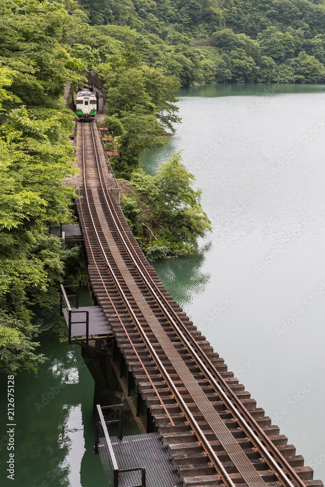 Tadami railway line and Tadami River in summer season at Fukushima prefecture.