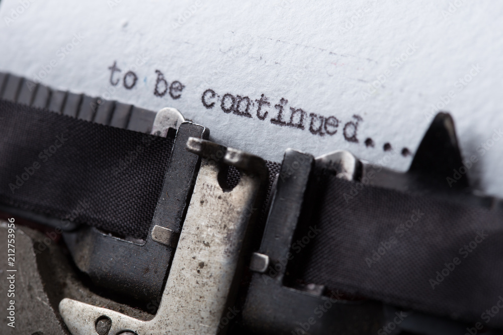 To be continued... typed words on a old Vintage Typewriter. Close up.