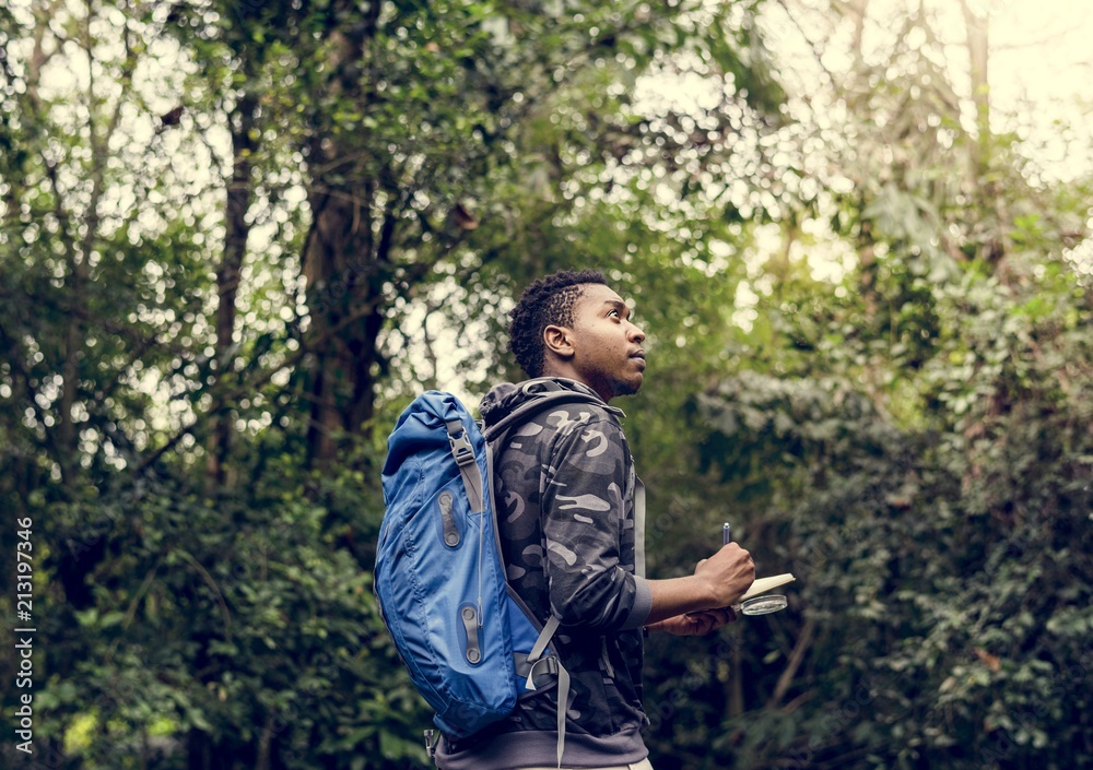 Biologist exploring in a forest