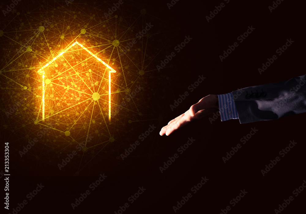 Conceptual image with hand pointing at house or main page icon o