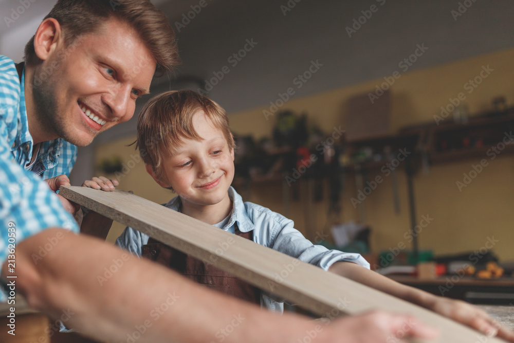 Happy family in the workshop