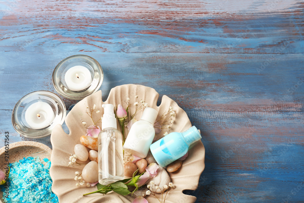 Beautiful spa composition on color wooden background