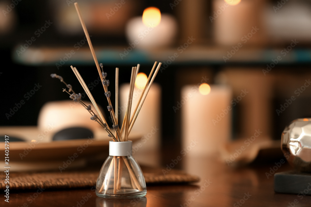 Aroma sticks on table in spa salon