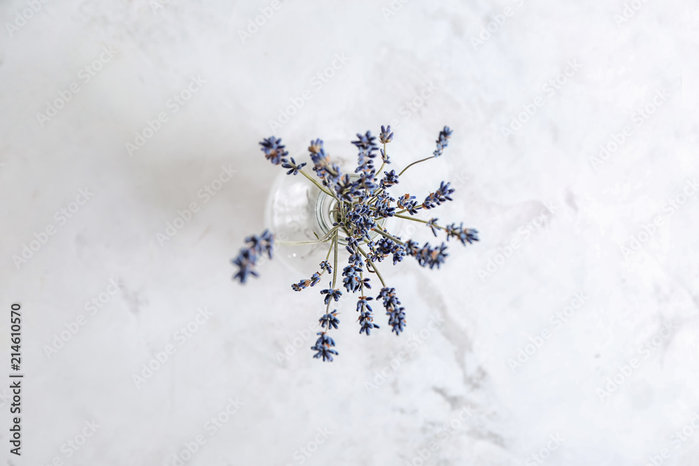 Vase with beautiful lavender on light table