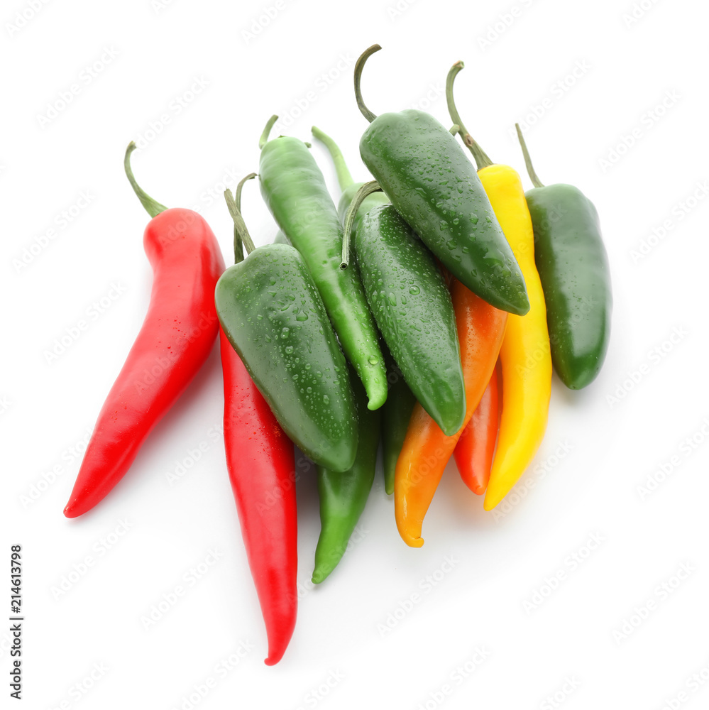 Fresh hot chili peppers on white background