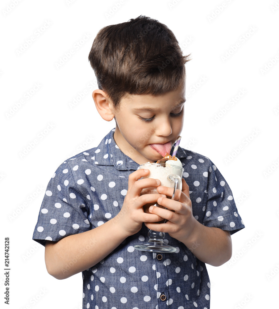 Cute little boy with cup of hot cocoa drink on white background