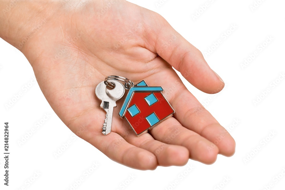 Hand Holding House Key