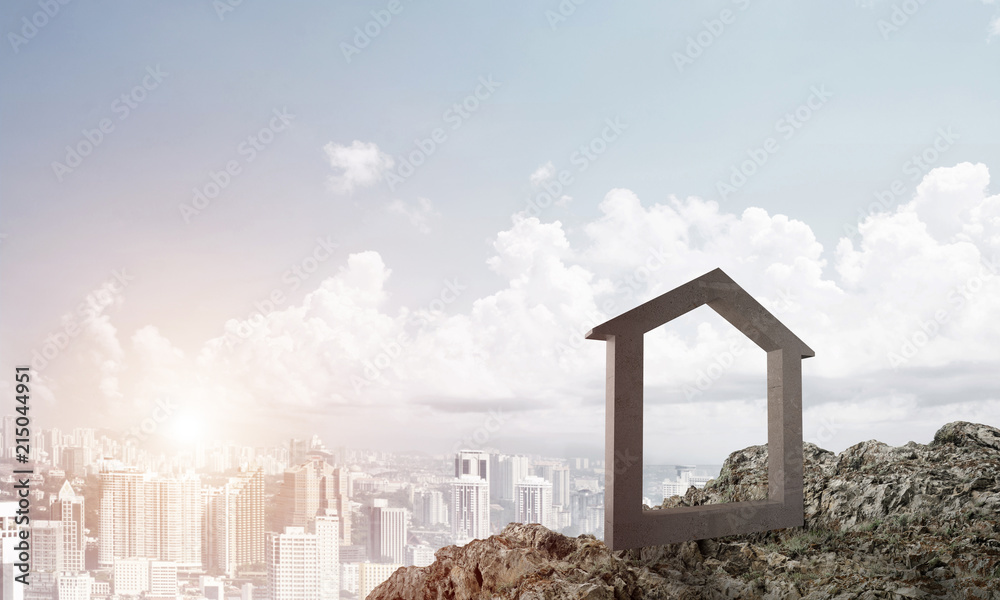 Conceptual image of concrete home sign on hill and natural landscape at background