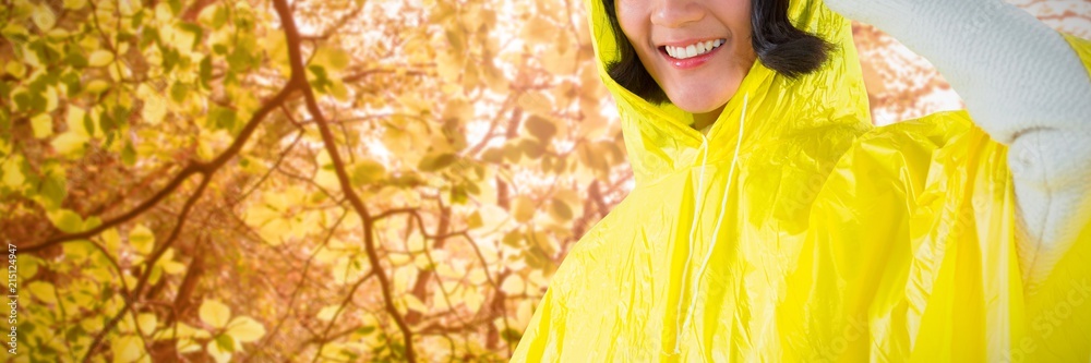 穿着黄色雨衣的女子与白色的合成图像