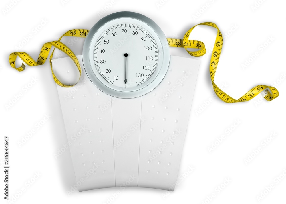 A Measuring Tape on a Weight Scale