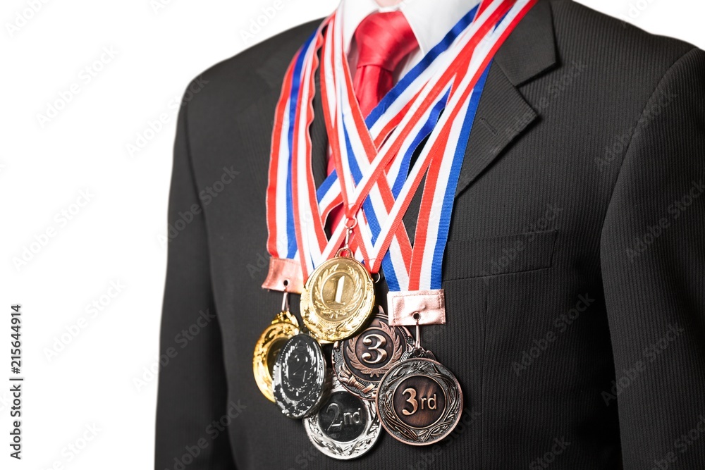 Closeup of Businessman Stands Decorated with Medals