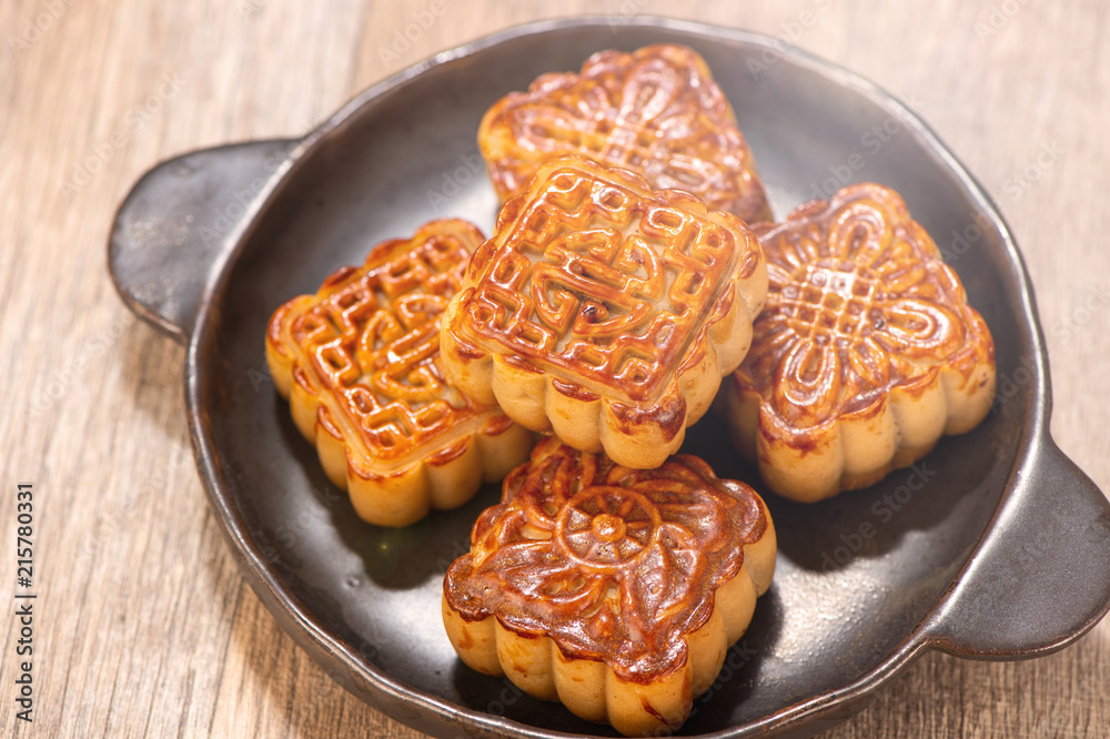 Mooncake in chinese traditional mid-autumn festival(moon festival) with copy space(text space) and t