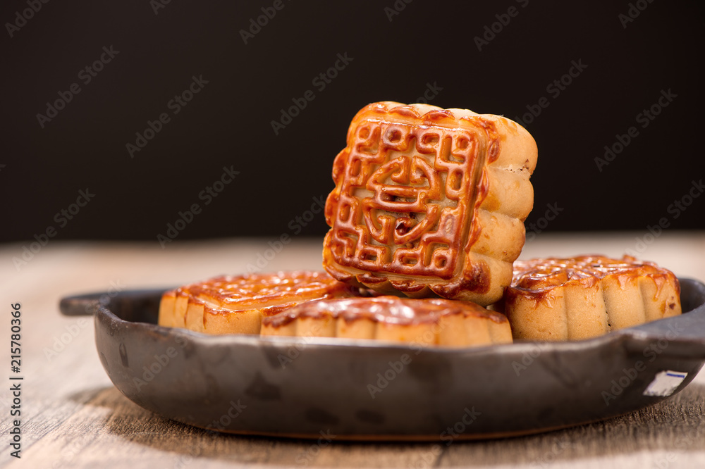 Mooncake in chinese traditional mid-autumn festival(moon festival) with copy space(text space) and t