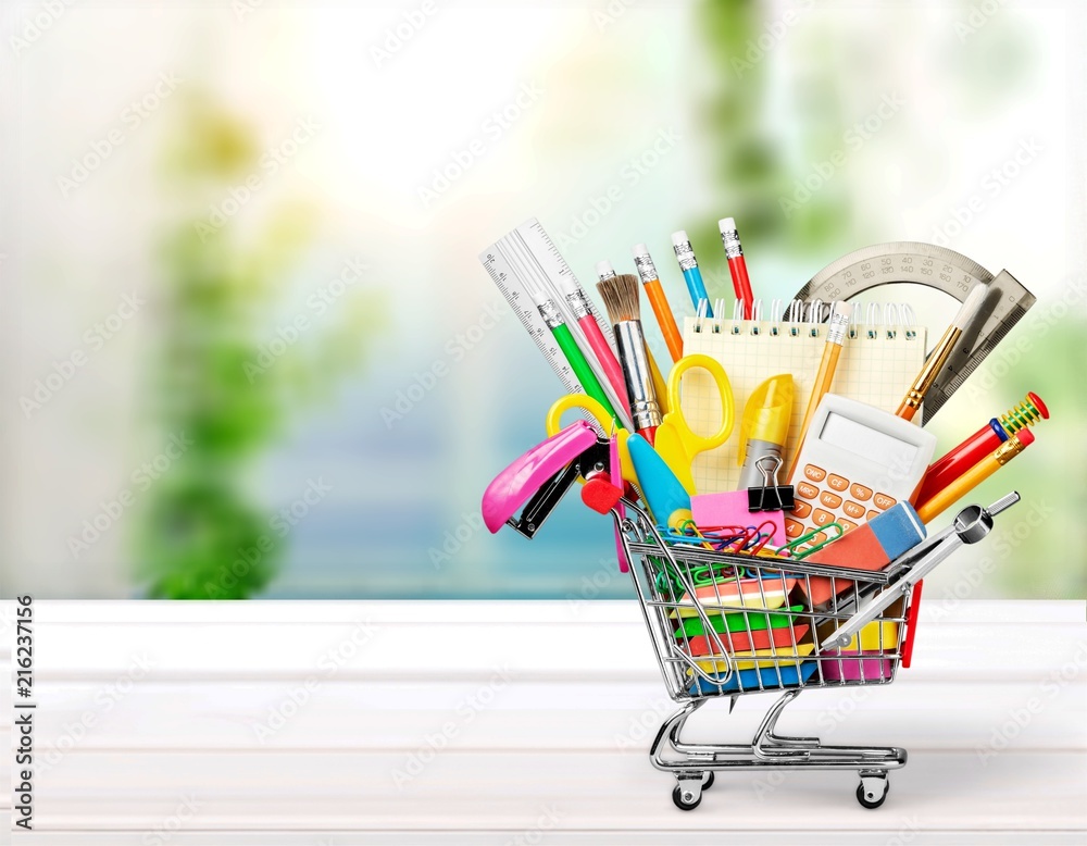 Stationery objects in mini supermarket cart