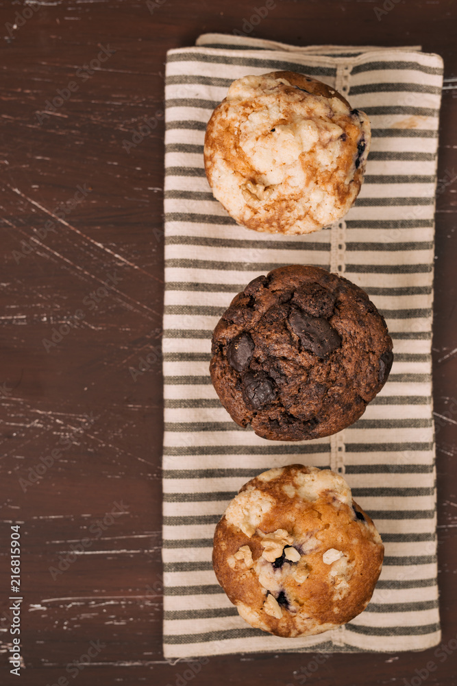 Fresh different homemade muffins on the table