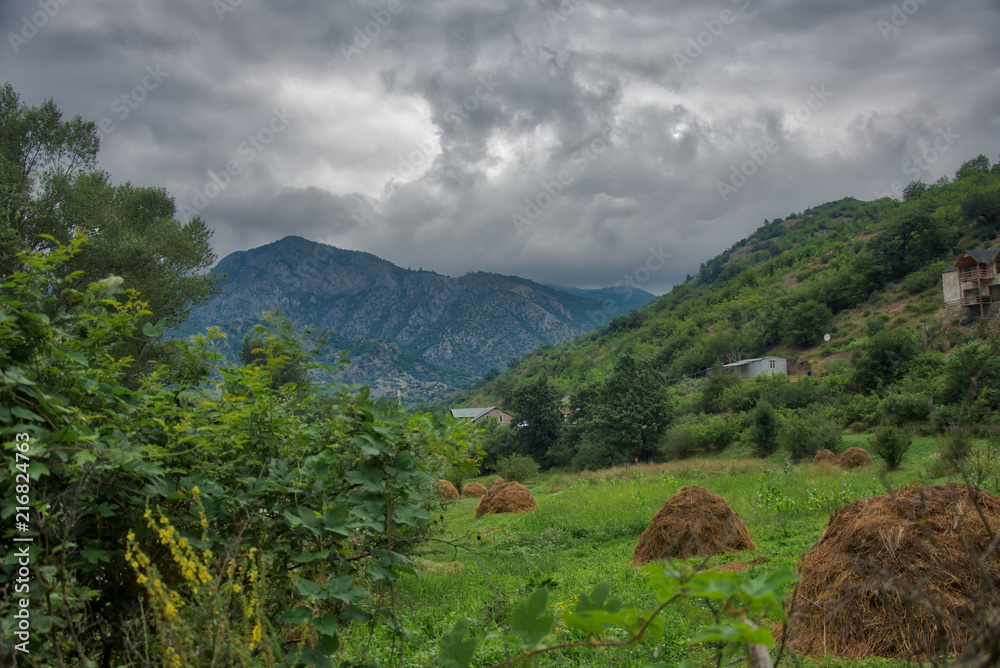 Mountain landscape view with clouds