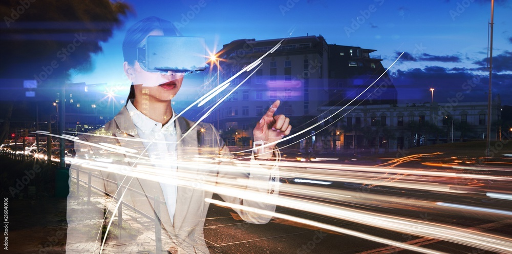 Composite image of businesswoman gesturing while wearing virtual