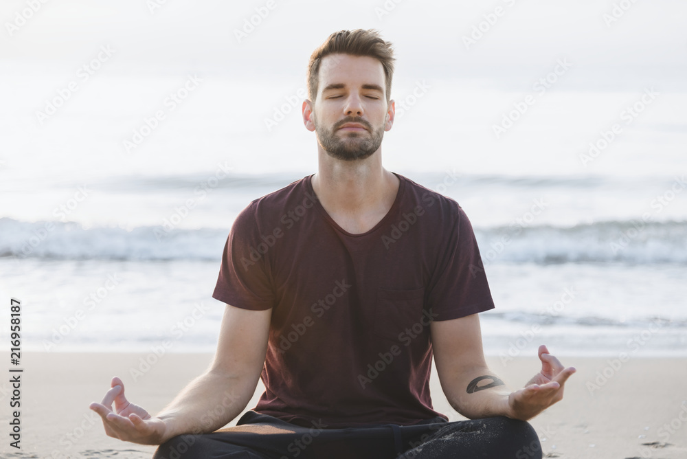 A man practicing yoga