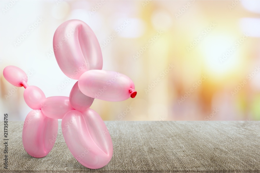 Pink balloon in form of dog