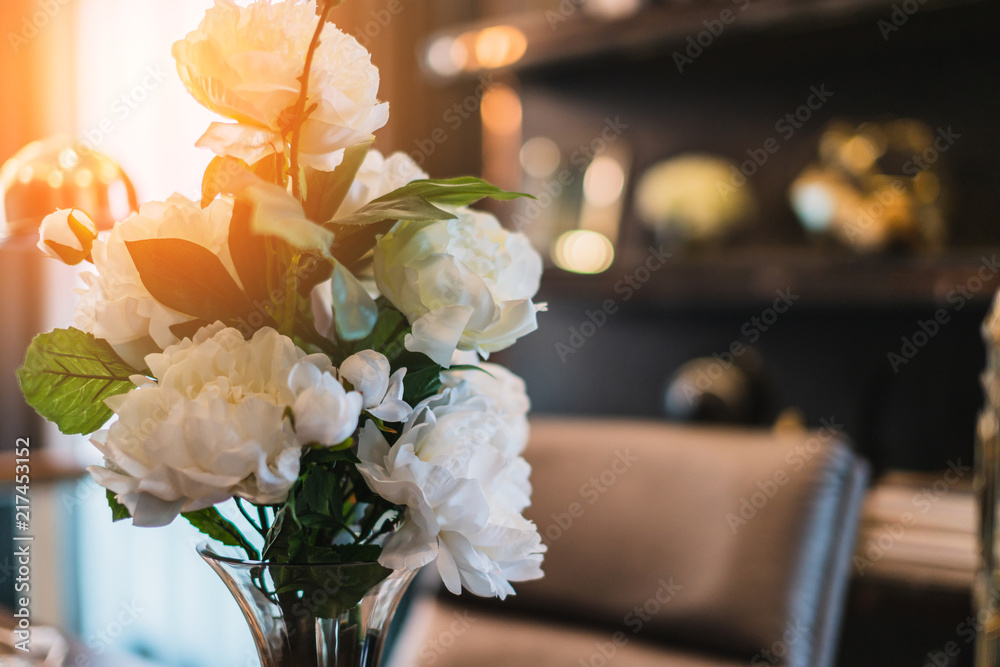 white flower with grey wall background vintage color tone