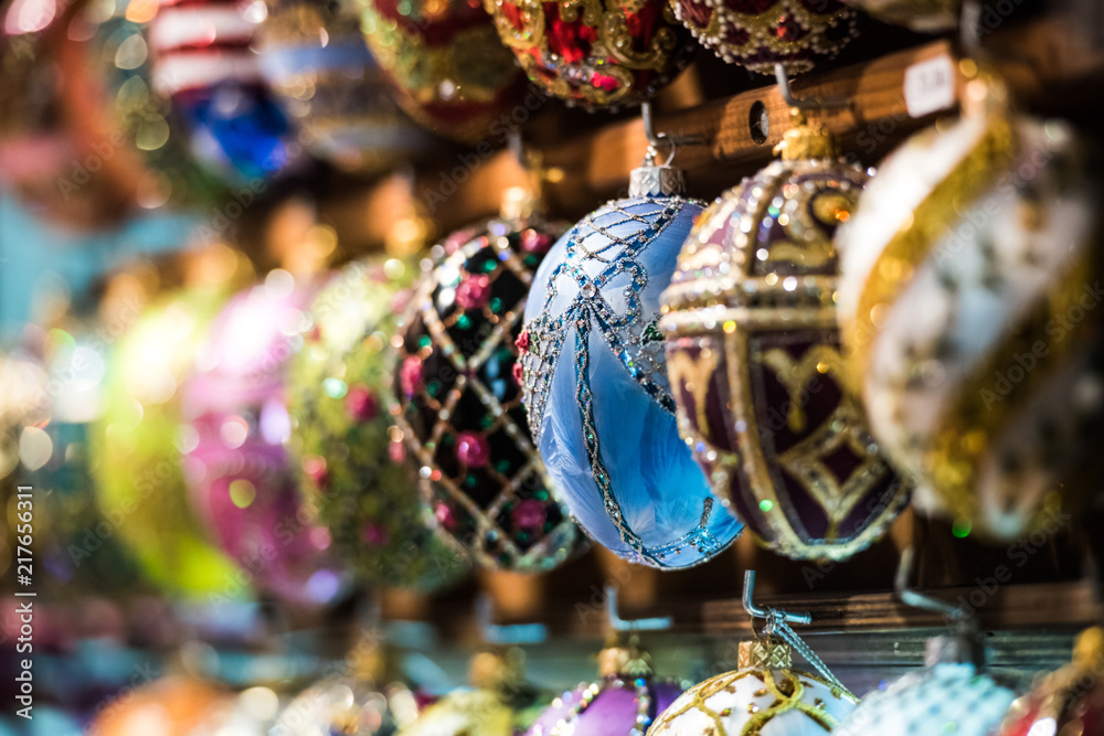 variety of colorful decorative egg toys at market