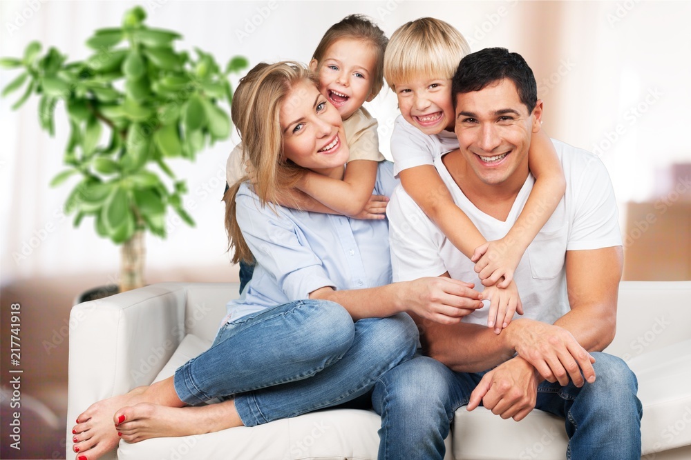 Beautiful smiling family in room